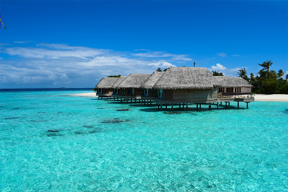 beautiful overwater spa in milaidhoo in the maldives