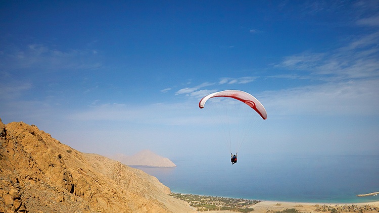 Paragliding at Six Senses Zighy Bay