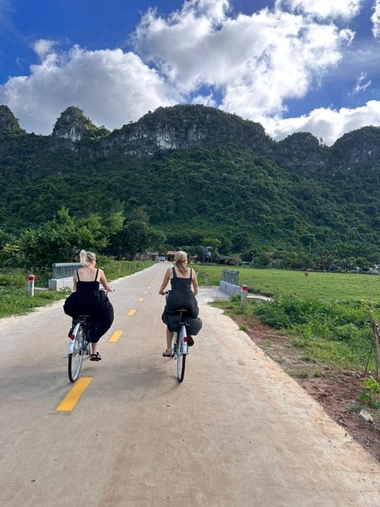 Rachel & Katie cycling on Cat Ba Island 
