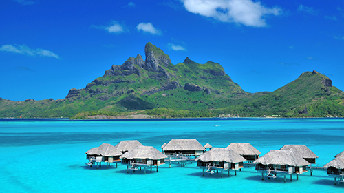 Bungalows and Mt Otemanu in Bora Bora, Tahiti