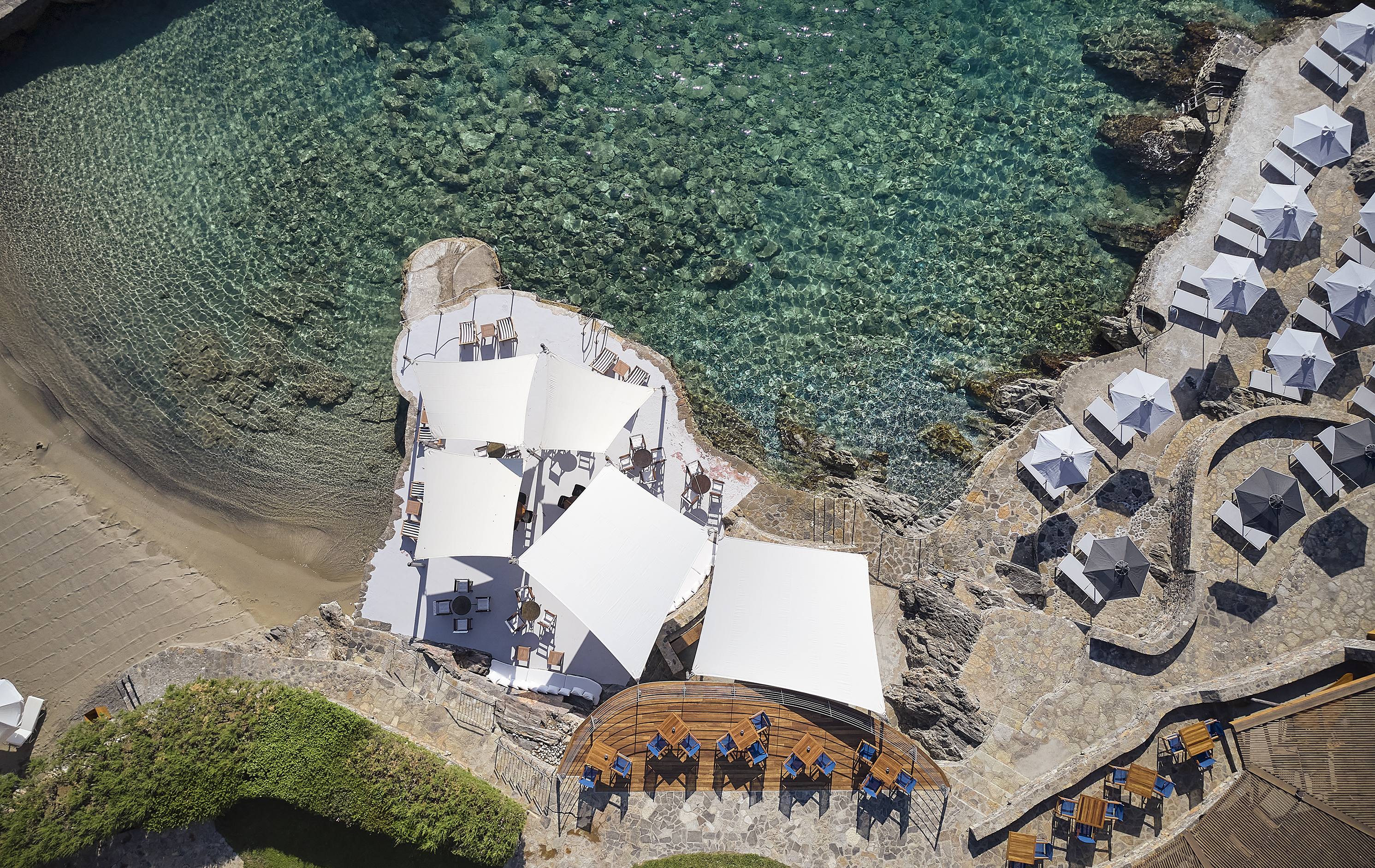 aerial view of the Bonatsa Jetty Bar at St Nicholas Bay in Crete