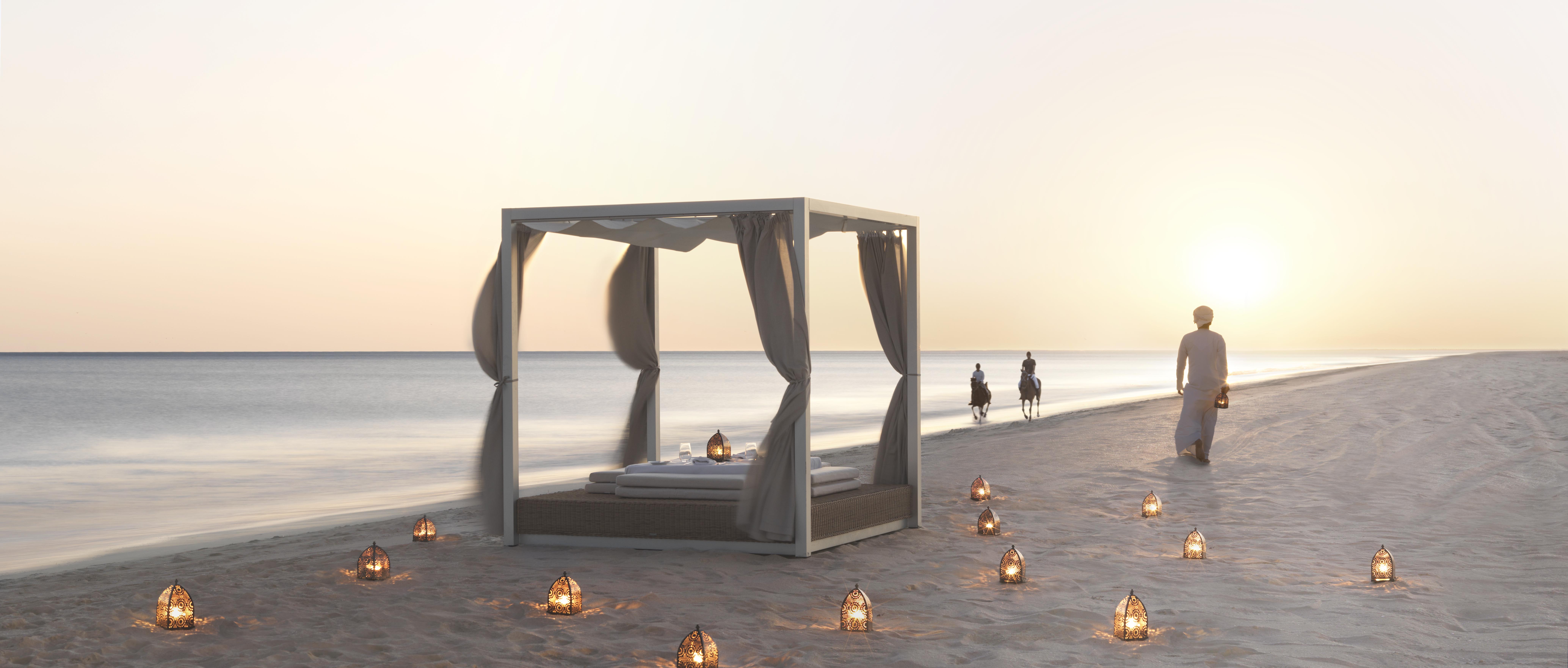 An intimate private dining location on the shore of the sea at Al Baleed Resort Salalah by Anantara, Oman