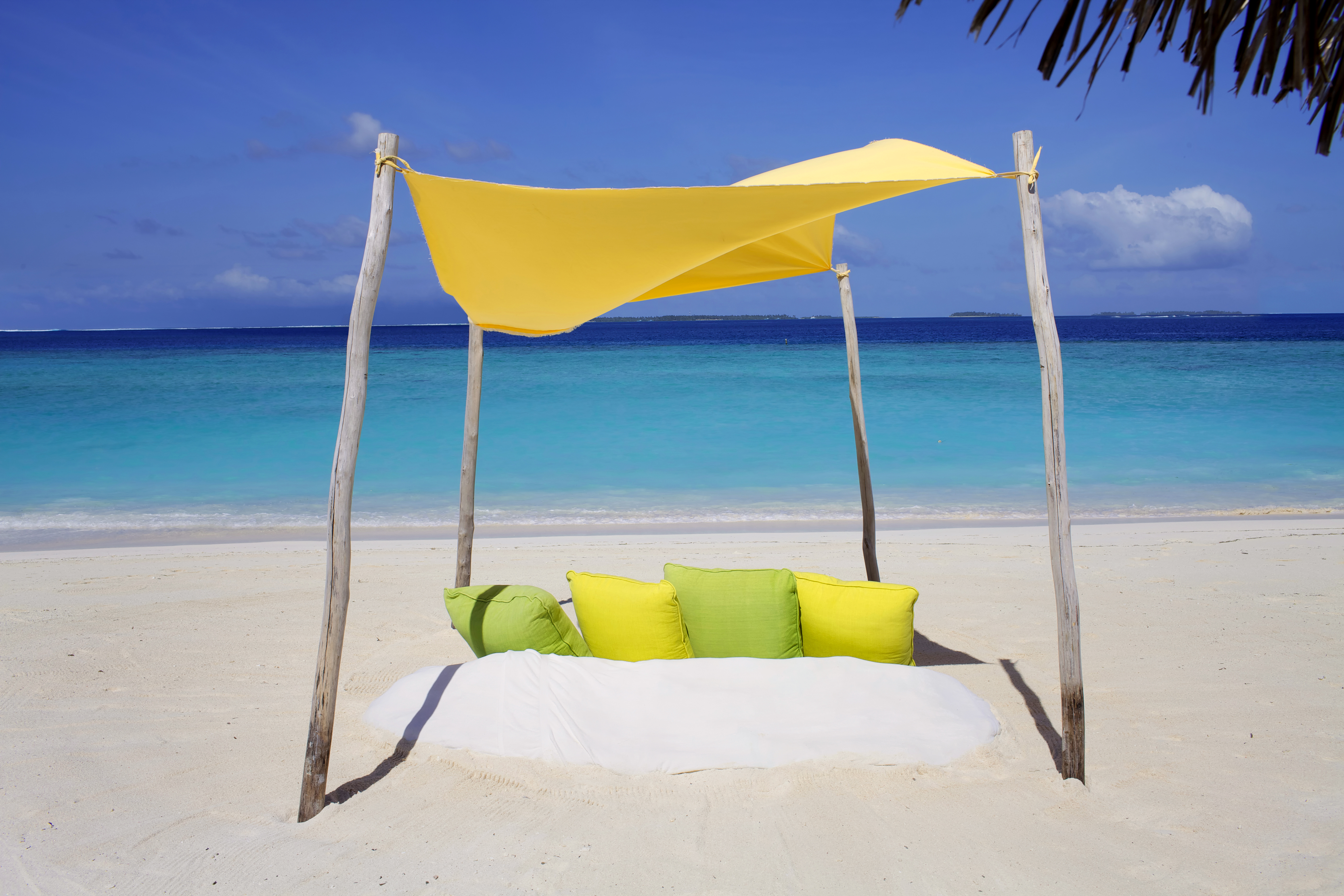 A perfectly isolated beach picnic area overlooking the sea at Six Senses Laamu, the Maldives