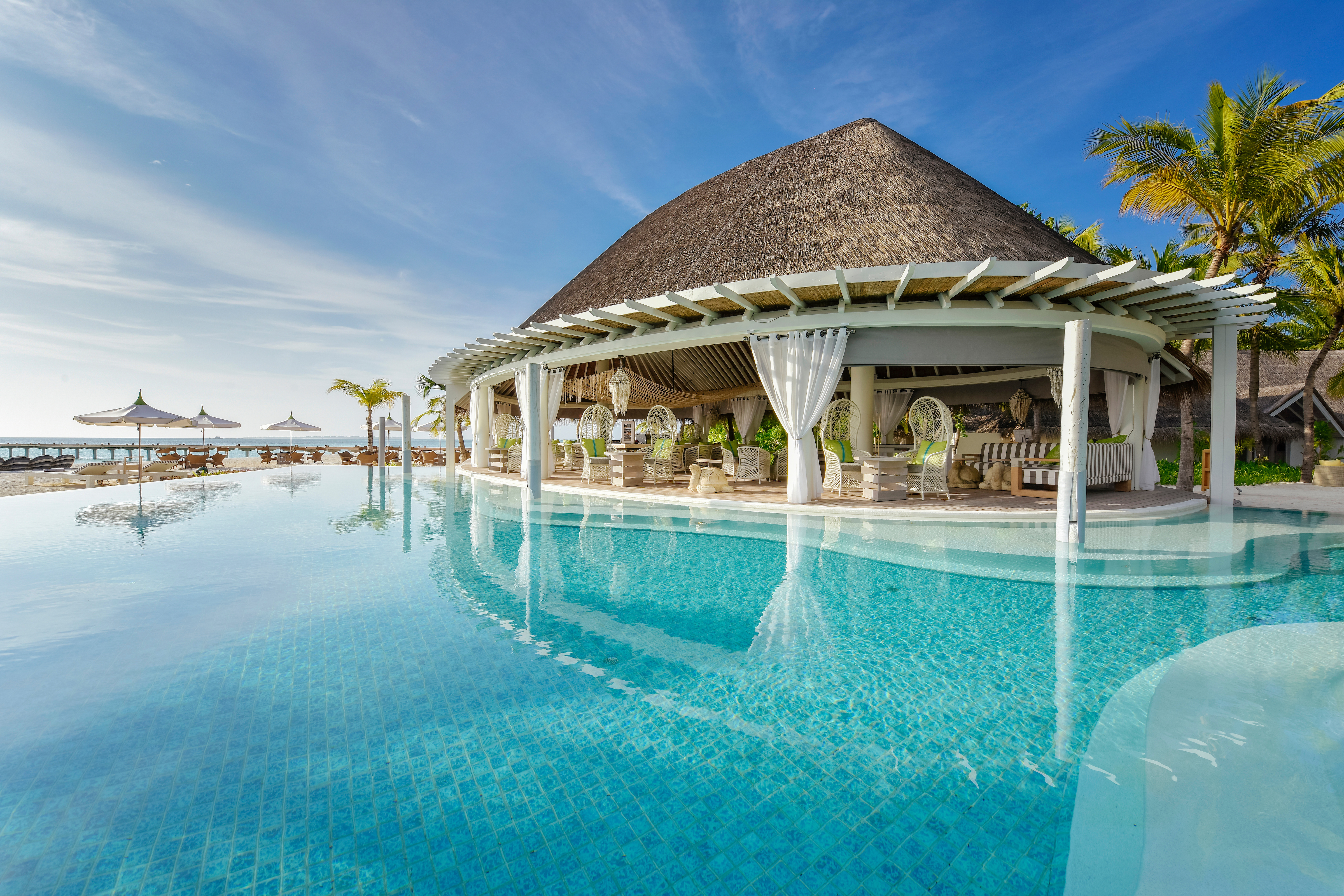 The indulgent Cowry Club sits over the inviting swimming pool at Kanuhura, the Maldives