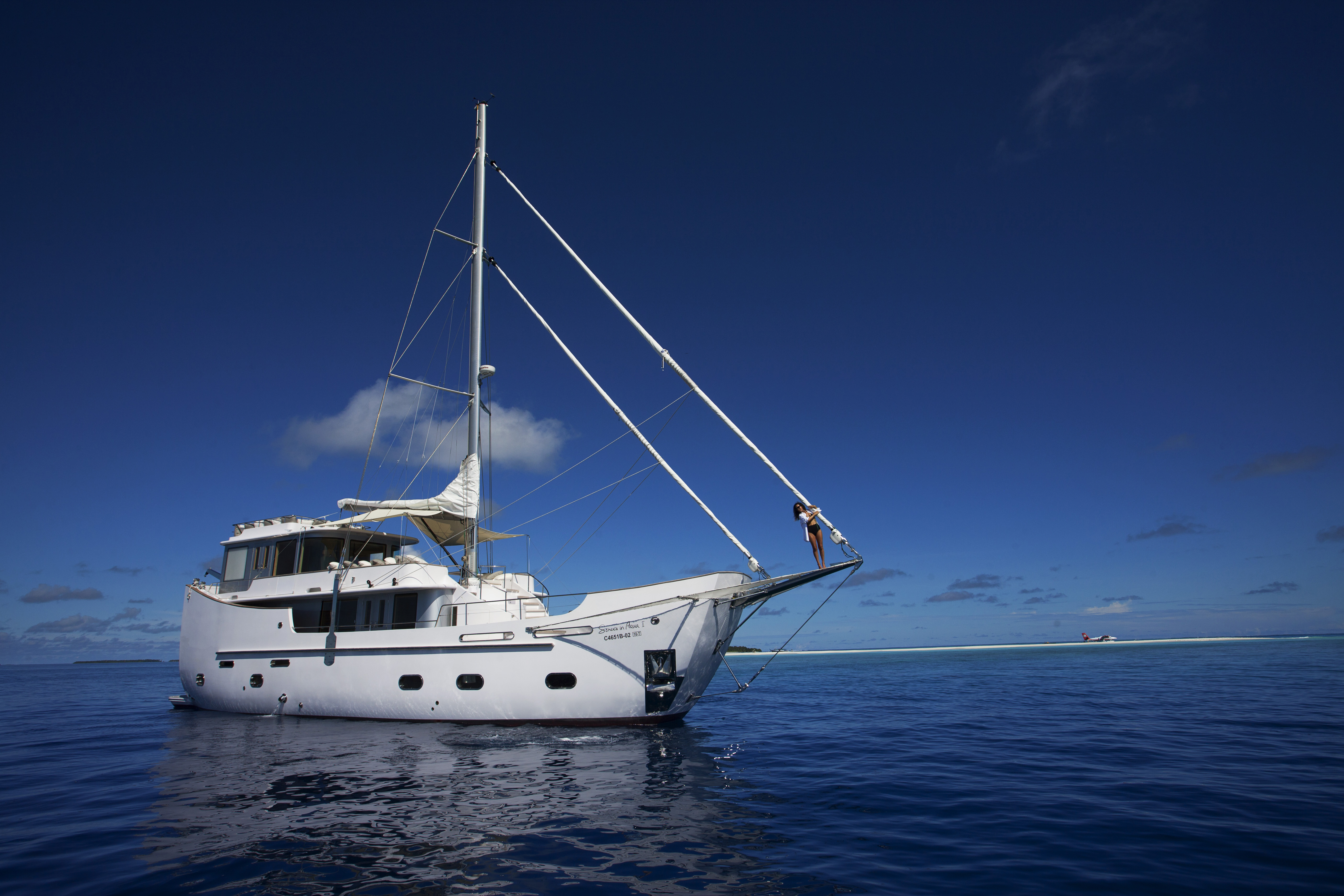 The yacht sailing over deep blue seas at Soneva in Acqua, the Maldives