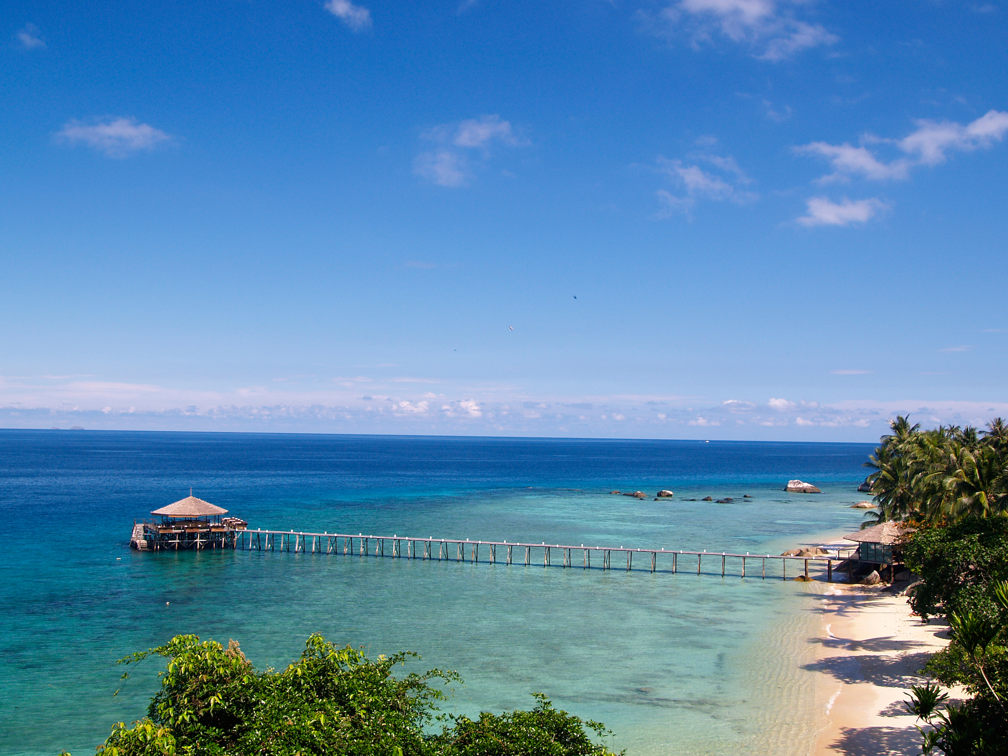 Views of the jetty in turquoise waters at Japamala